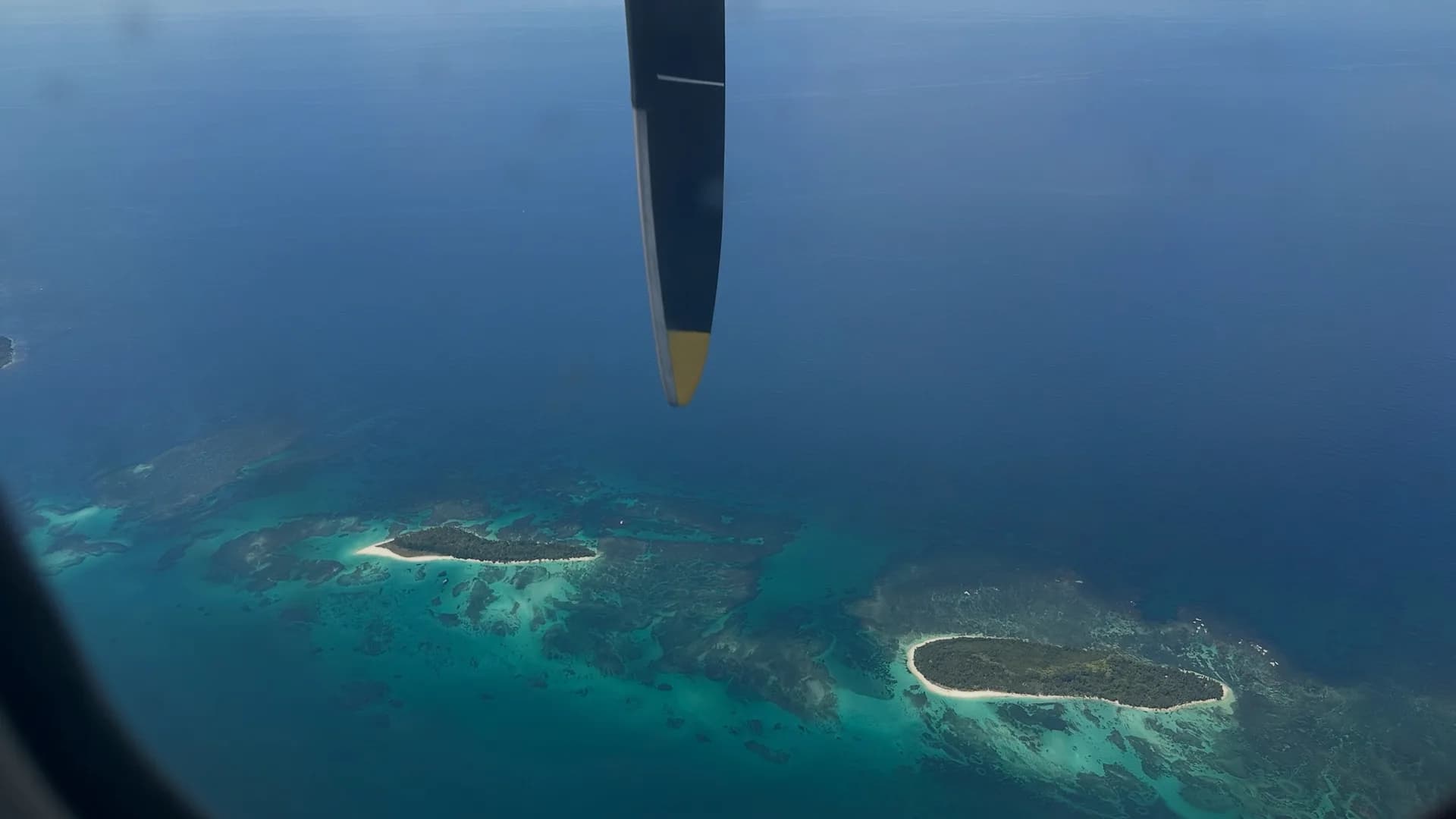 Islands and reefs of Caribbean Panama seen from a plane during a domestic flight