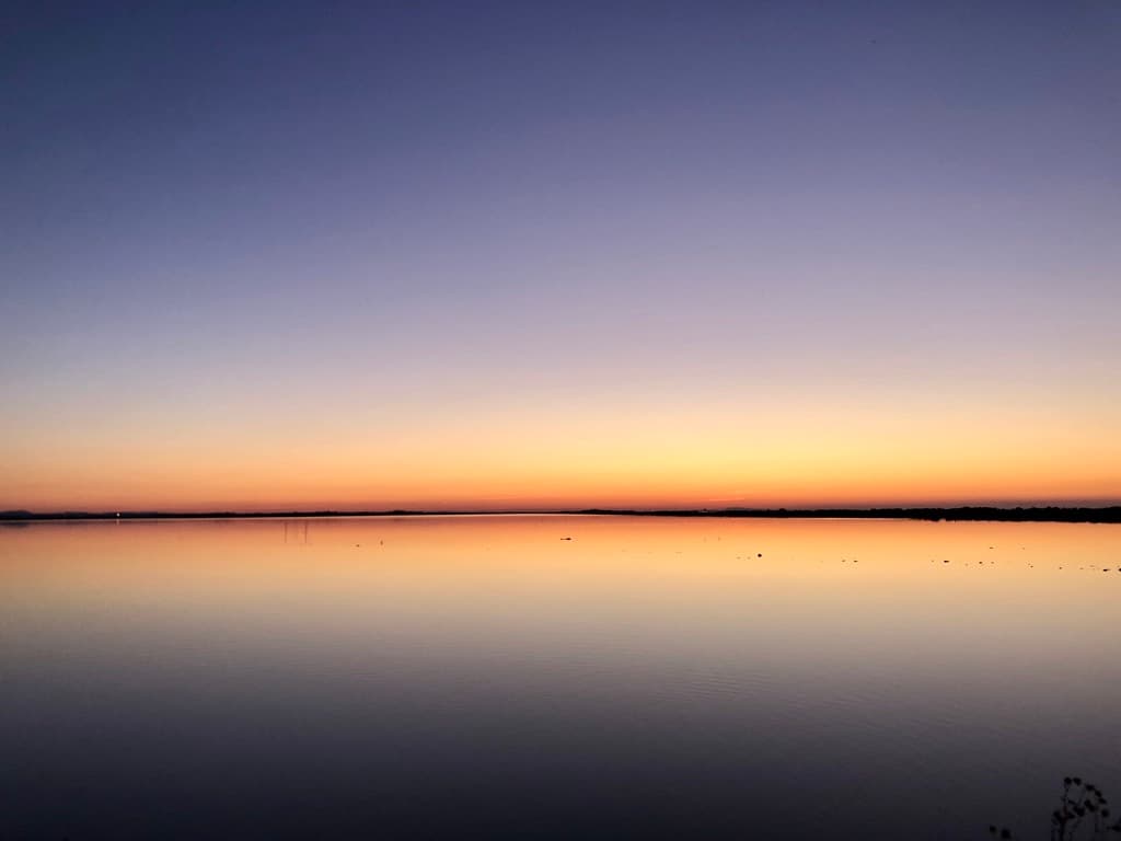 Sunset over calm waters